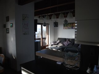 Wohnzimmer mit ausziehbaren Sofa