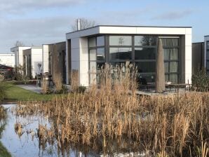 Maison de vacances 32 met motorboot