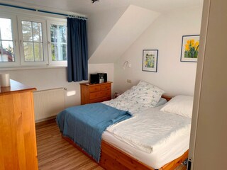 Schlafzimmer mit Doppelbett