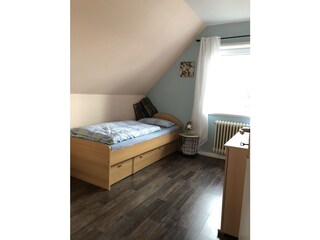 Schlafzimmer mit einem Einzelzimmer