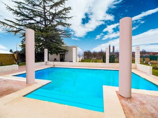 Villa Dueñas Buitenaudio-opname 4