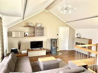 Wohnzimmer mit Kamin – gemütliche Abende.