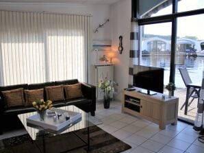 Casa vacanze Aquaronde 16, con pontile + barca sportiva