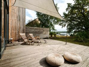 Ferienhaus Haus Übersee mit Wasserblick - Schwarz - image1