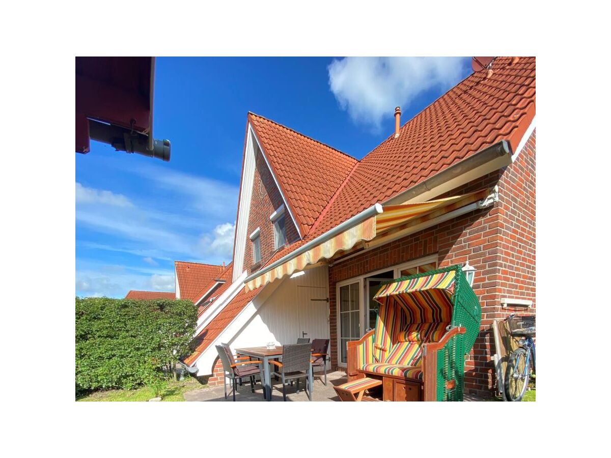 Ferienhaus Am Deich, Zum Hallenbad 23b, Hooksiel, Firma