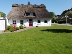 Pauze onder het rieten dak