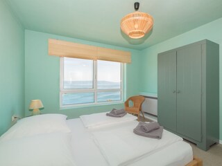 Schlafzimmer mit Blick aufs Meer