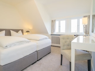 Schlafzimmer mit Doppelbett