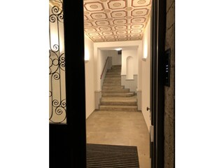 House entrance featuring original ceiling painting