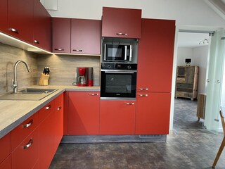 Kitchen, view towards the living room