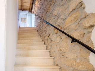 Die Treppe führt zu einem Schlafzimmer