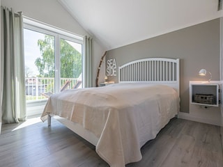 Die Schlafzimmer haben Balkon mit Landschaftsblick