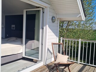 Die Schlafzimmer haben Balkon mit Landschaftsblick