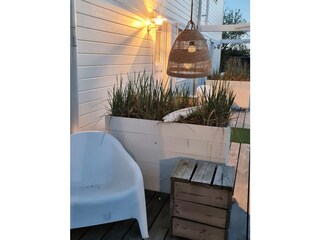 Terrace behind the house with maritime decoration