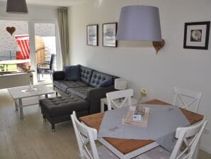 strandnahe Ferienwohnung mit Terrasse und Strandkorb