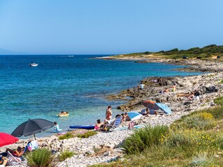 Strand, kristallklares Meer