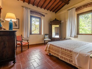 The main bedroom with a king bed