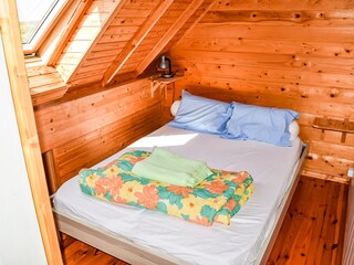 Schlafzimmer mit Doppelbett