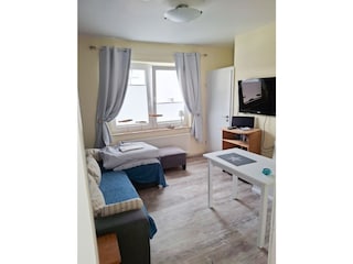 Wohnzimmer (mit ausziehbarer Schlafcouch)