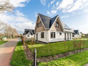 Holiday house Schönes Ferienhaus mit Sauna bei De Koog - Den Burg - image1