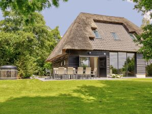 Ferme Jolie maison de vacances à Rijsbergen avec un jardin et un bain à remous - Bréda - image1