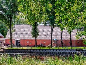 Casa de vacaciones en Veendam con terraza privada - Spijkerboor - image1