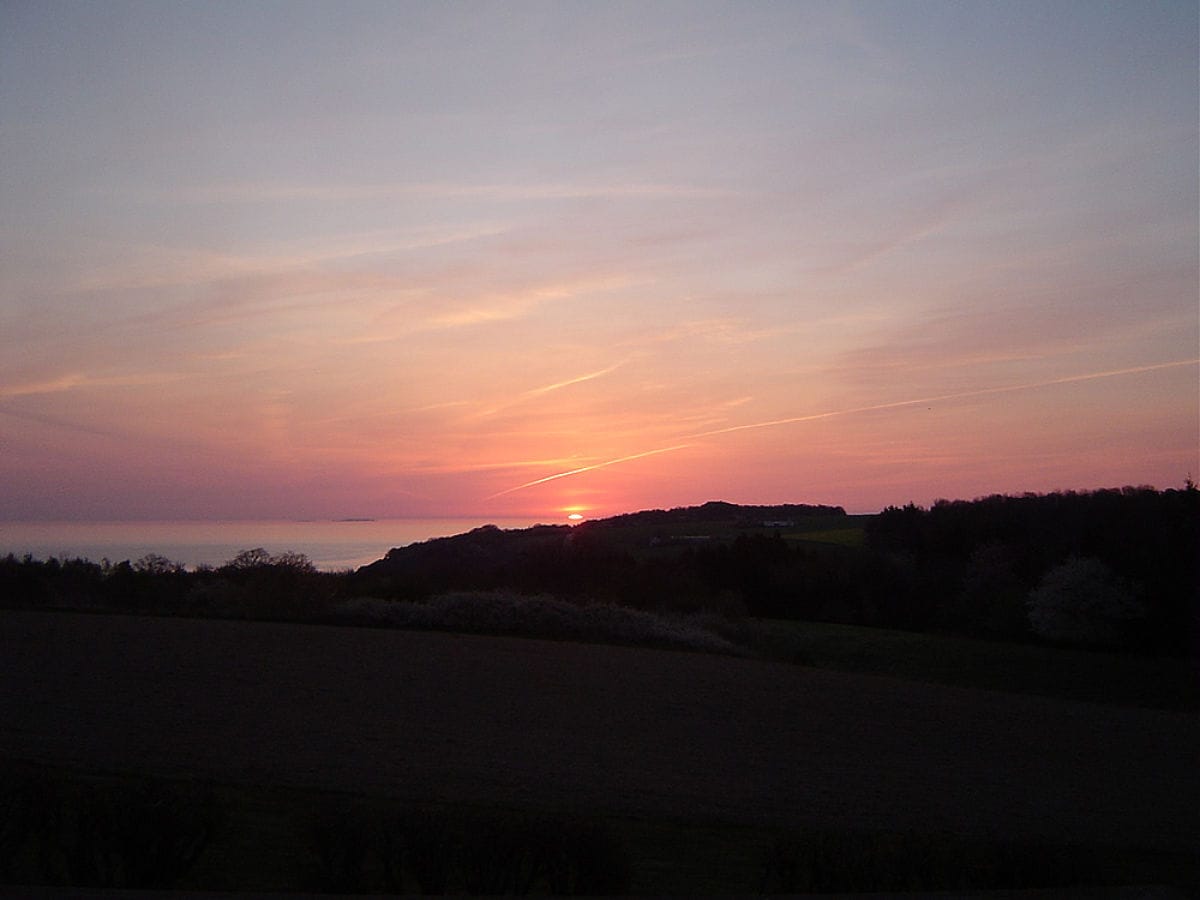 Sunnenaufgang über Bokul