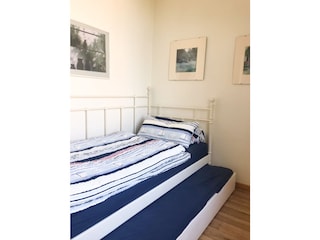 zweites Schlafzimmer mit ausziehbarem Tandembett