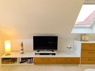 Wohnwand Ferienwohnung Grachtenhimmel Greetsiel