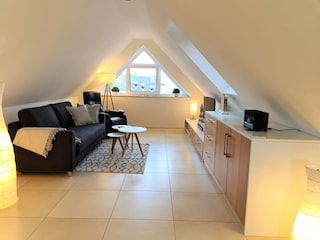 Wohnbereich mit Schlafsofa Ferienwohnung Grachtenhimmel