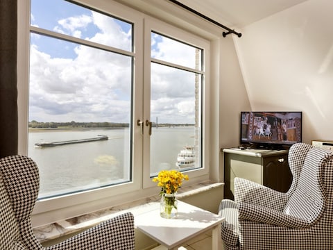 Ferienwohnung "Fährmann" im Häuschen am Rhein