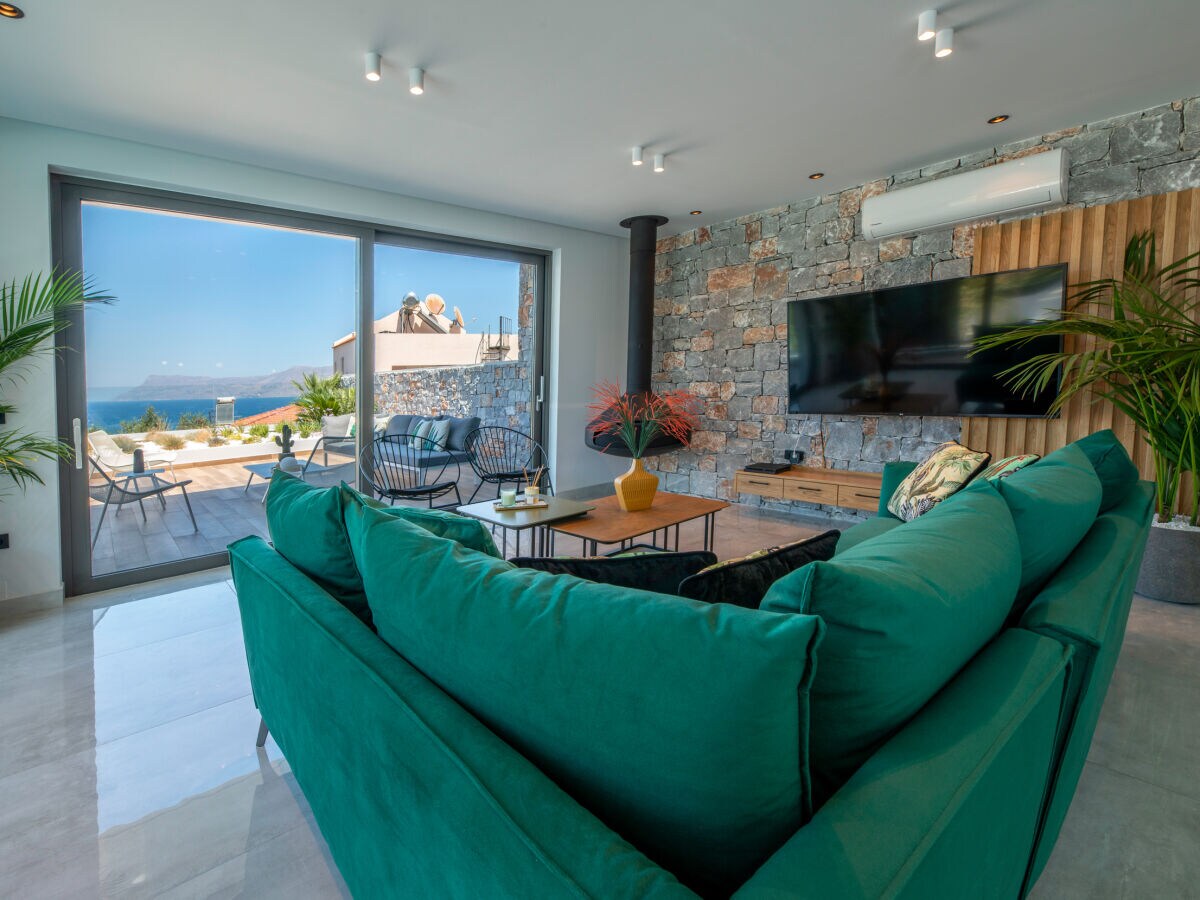 Living room with hanging fireplace