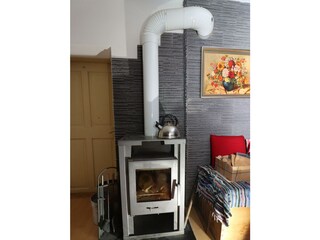 1. OG Eingang grünes Zimmer + Kaminofen