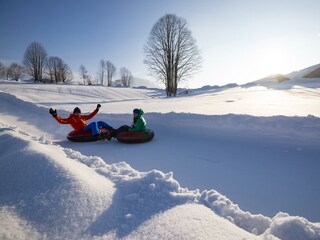 Snowtubing im Kaiserwinkl