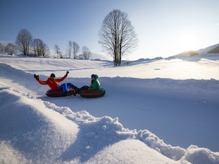 Snowtubing im Kaiserwinkl