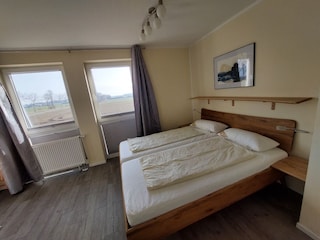 Schlafzimmer mit Meerblick