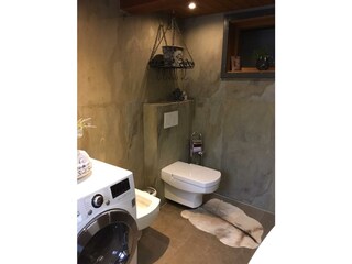 chalet_penzn_uderns_Badezimmer_Waschmaschine