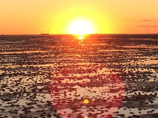 Wattwanderung bei Sonnenuntergang