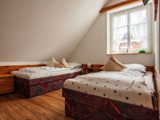 Schlafzimmer mit Einzelbetten