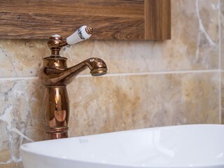 Casa Rustica  - Bronze bathroom