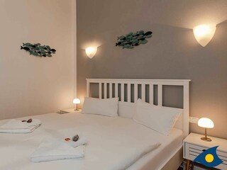 Schlafbereich mit Doppelbett