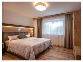 Söll_APARTdeluxe_Schlafzimmer_WilderKaiser