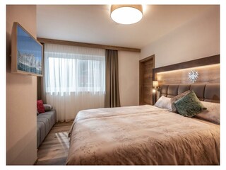 Söll_APARTdeluxe_Schlafzimmer_WilderKaiser
