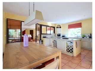 Large kitchen with extra dining table