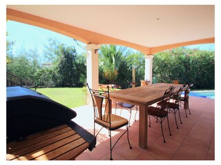 Outside dining area with BBQ