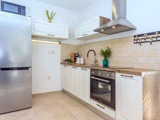 A fully equipped kitchen with all a modern guest needs