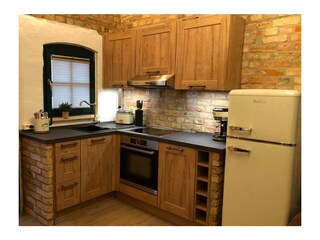 Die vollausgestattete Küche lässt keine Wünsche offen