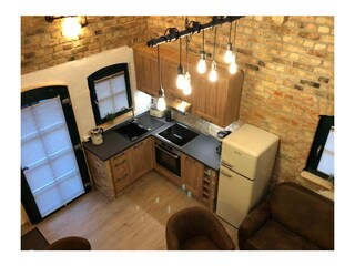 Blick vom Schlaf-Boden in den Wohnraum