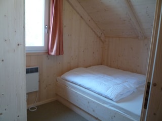 Schlafzimmer mit Doppelbett