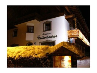 Gästehaus Rettenbacher Hausansicht Winter Abend